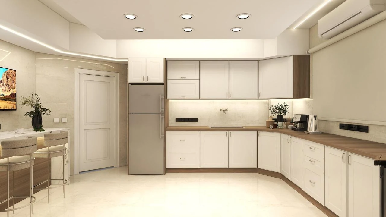 Wide kitchen design with illuminated cabinetry and an adjoining dining space