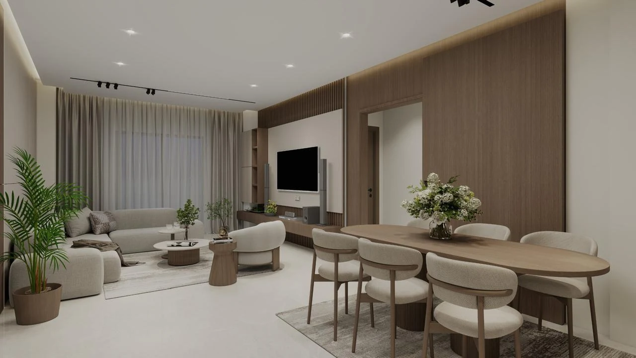 Open living and dining design with pale upholstery, a timber dining table and indoor plants